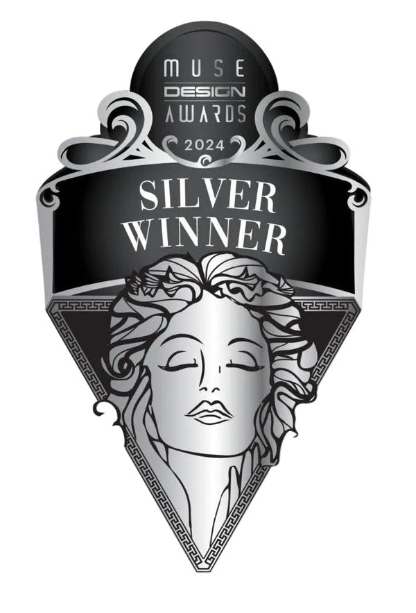 A black and silver award badge reading 'MUSE DESIGN AWARDS 2024 SILVER WINNER' with an ornate decorative border and a stylized female face illustration on a white background.